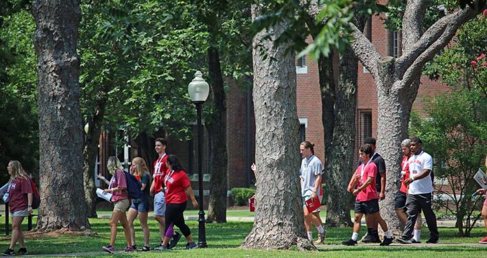 orientation students walking on the Green